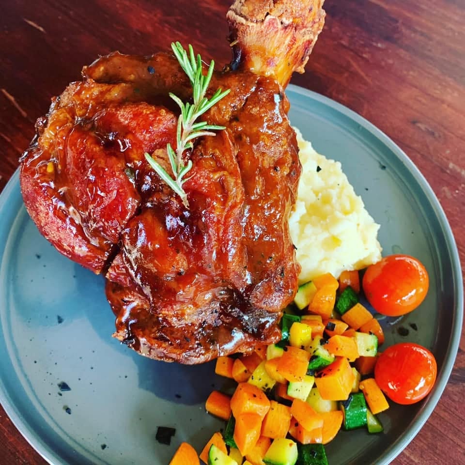 Grilled steak served with vegetables and mash at Café Crust